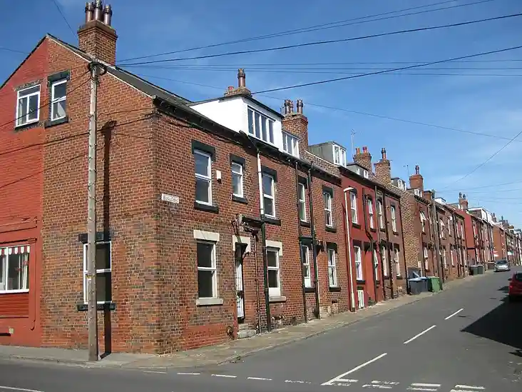 a row of brick buildings on a street